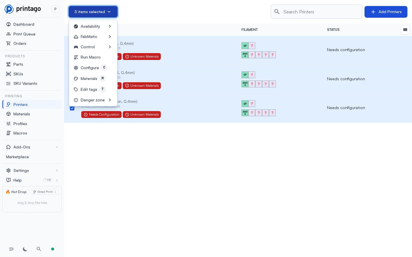 The printers list with printers selected and the bulk actions menu open on Run Macro